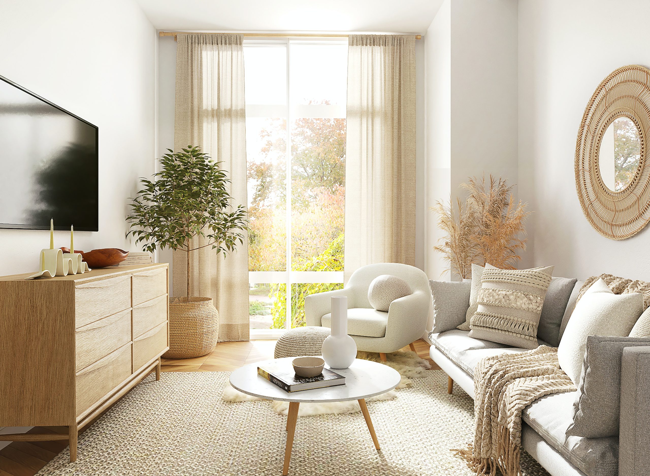 Sala peque&ntilde;a con decoraci&oacute;n minimalista, sof&aacute; gris y silla blanca junto a la ventana